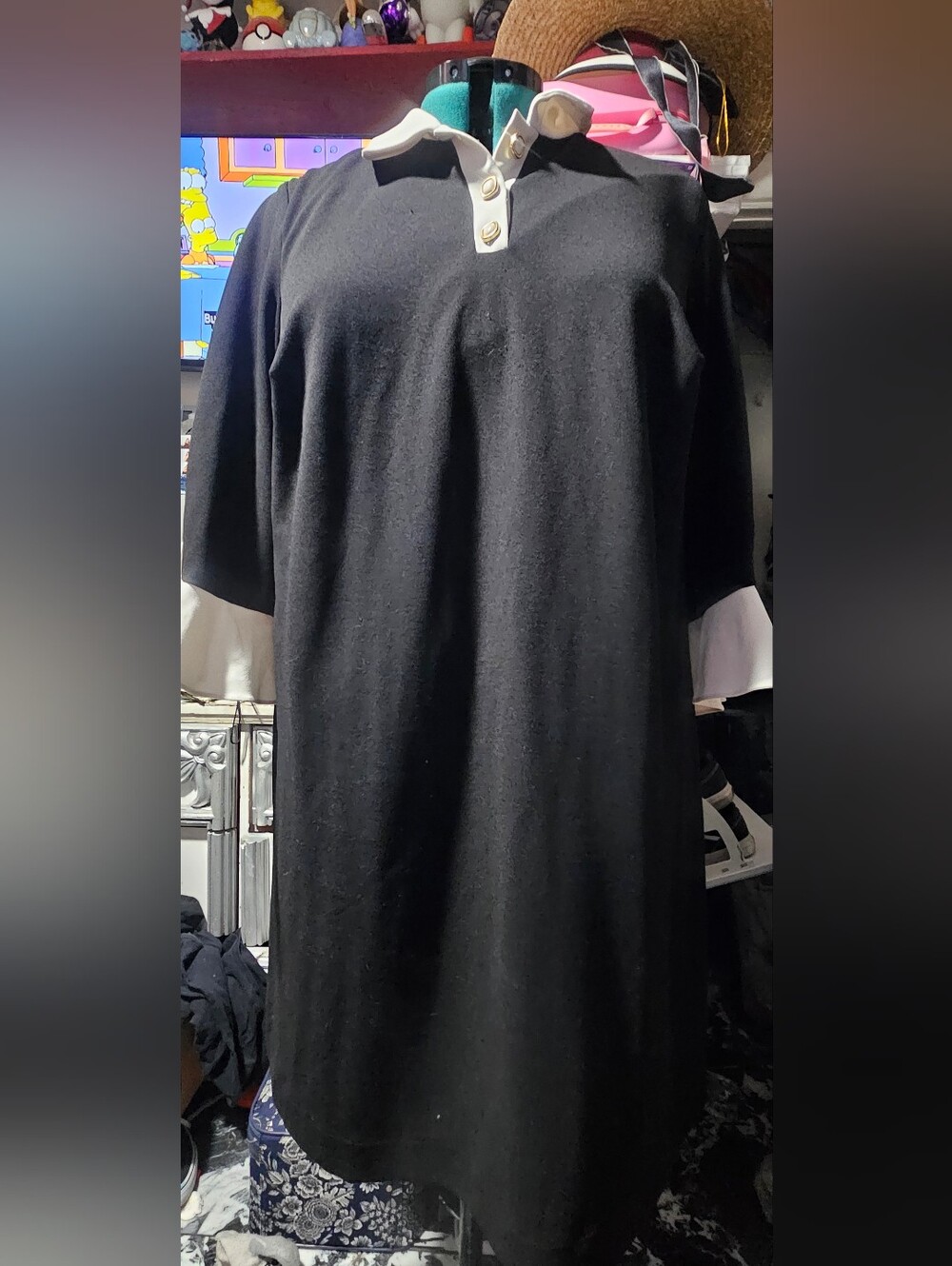 black short-sleeve midi shift dress featuring a contrasting white